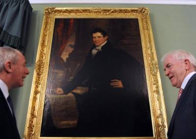 Minister of State at the Department of Transport, Tourism and Sport Michael Ring and Minister Jimmy Deenihan pictured beside a painting of Daniel O'Connell.